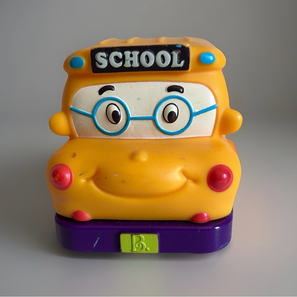 Battat mini yellow and Purple Cartoon School Bus Toy